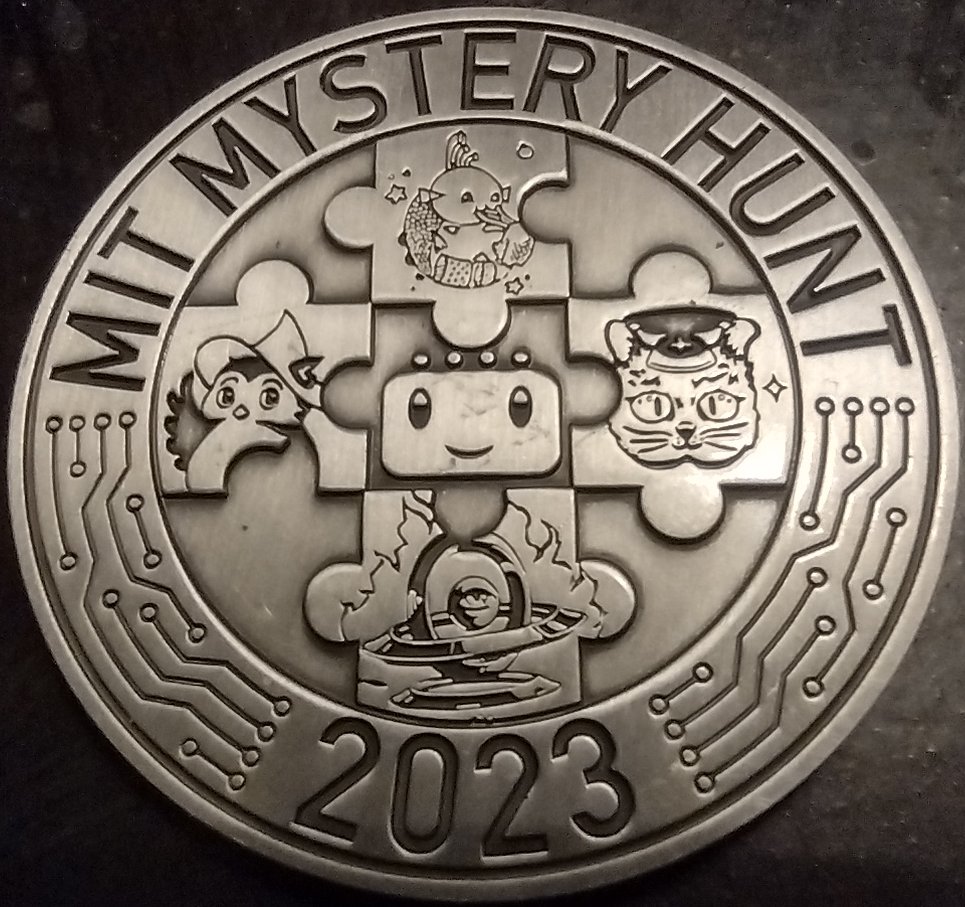 Front of
      the MIT Mystery Hunt 2023 coin, showing the 5 AIs